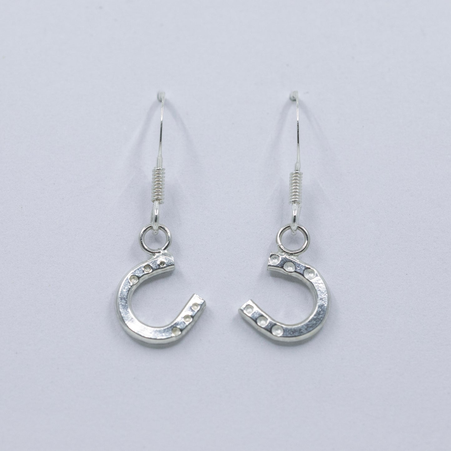Sterling Silver Horseshoe drop earrings.