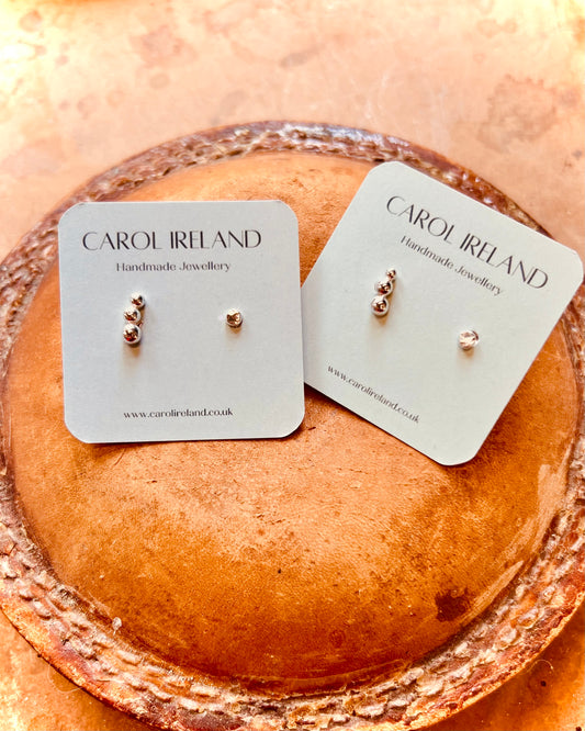Tiny Sterling silver stud earrings, mismatched pair for extra piercings