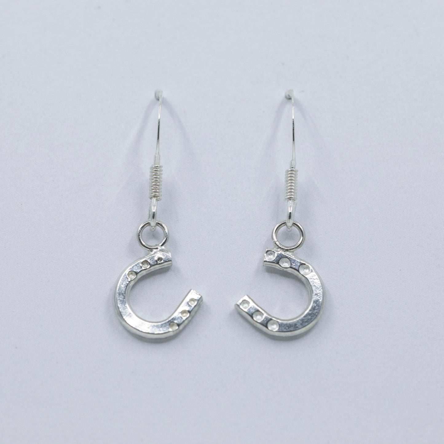 Sterling Silver Horseshoe drop earrings.